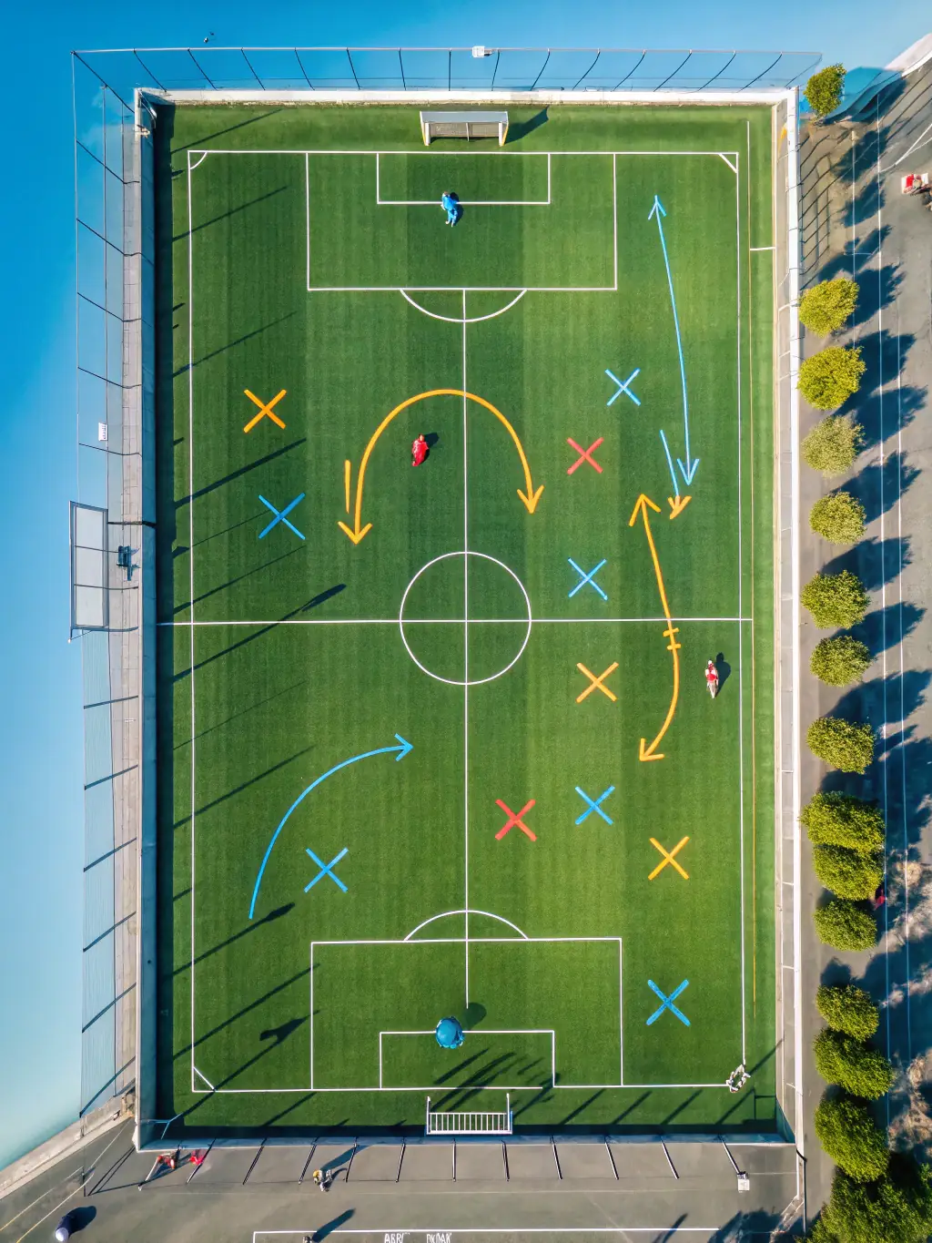 A vibrant image of young children participating in a soccer training session, showcasing teamwork and fun, set against a sunny backdrop at La Spezia Milano 1975's training grounds.
